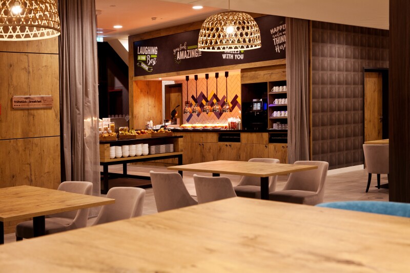 TheA photograph of the dining area where guests can have complimentary breakfast at Hampton by Hilton Aachen Tivoli, Germany