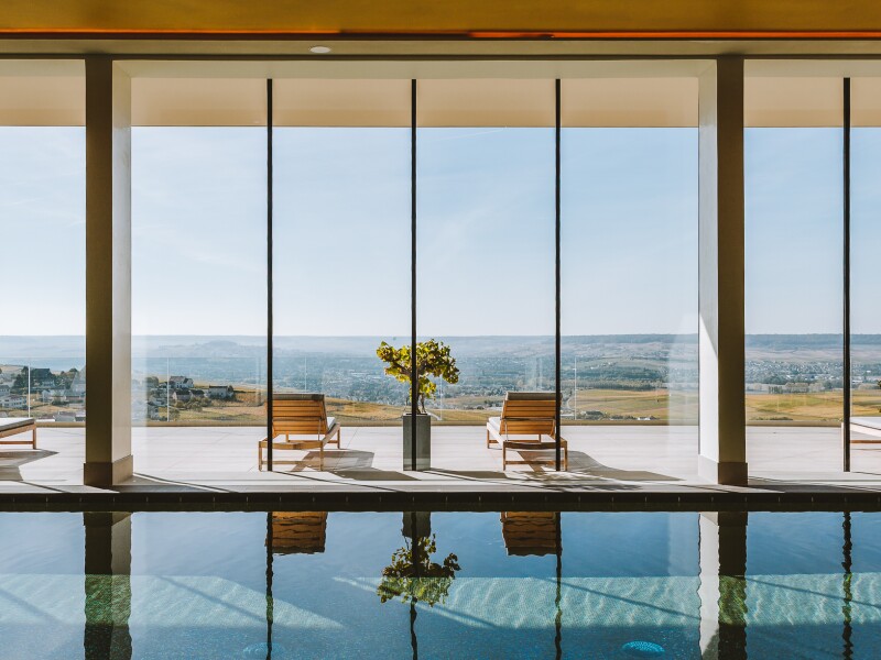 The indoor pool at the Royal Champagne in France overlooks the countryside