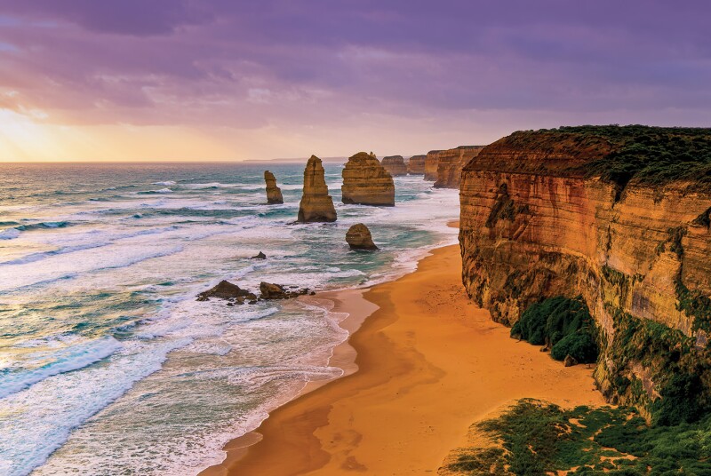 Sunrise over Twelves Apostles in Great Ocean Road, Victoria, Australia. The Twelve Apostles is a collection of limestone stacks off the shore of the Port Campbell National Park.