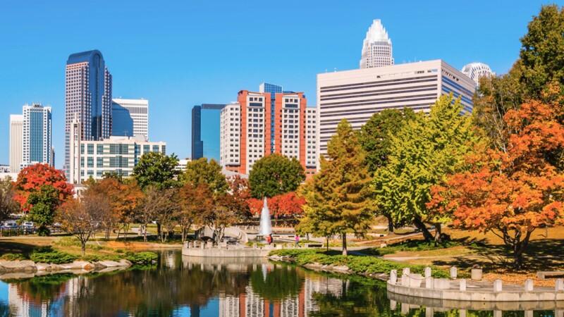 Park with colorful trees in downtown Charlotte, North Carolina, in fall