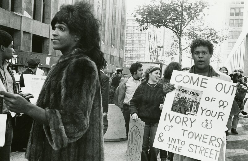 Marsha P. Johnson hands out flyers in support of gay students at NYU in 1970. (Image by Diana Davies)