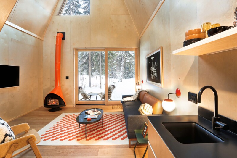 The A-Frame Club in Winter Park, Colorado, is decorated with vintage furnishings and Malm fireplaces.