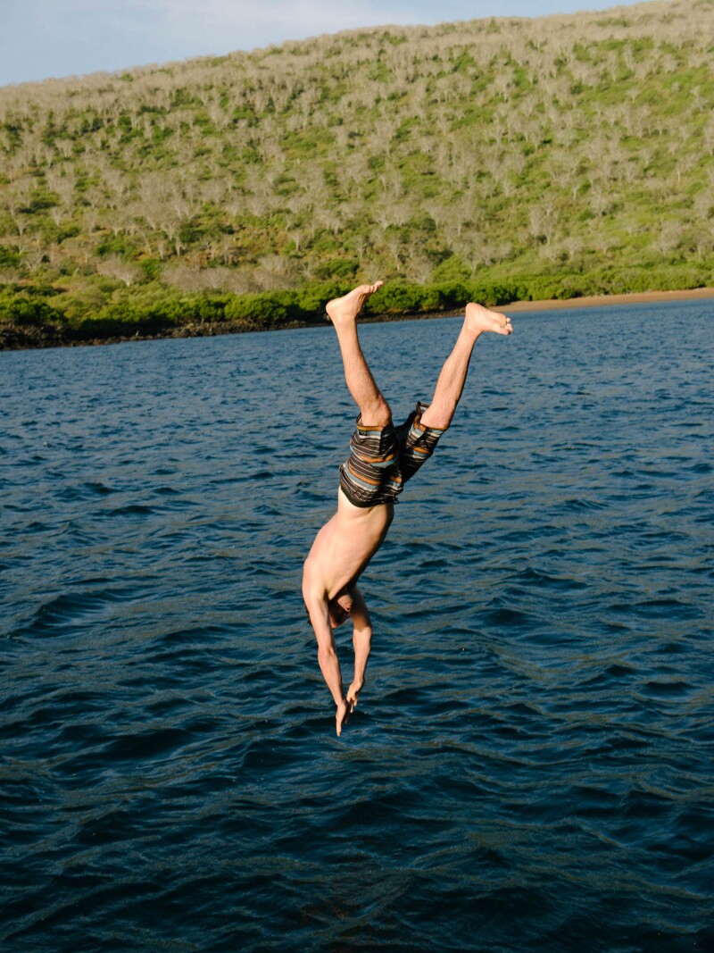 Daniel diving from the Tip Top III, Santiago Island, Day 4, Galapagos, Ecuador