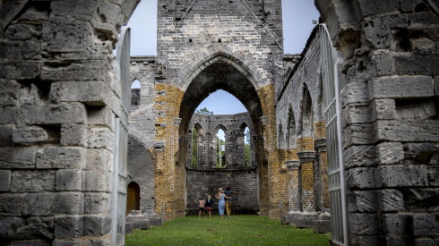 Weathered grey stone and towering archways make for a fascinating backdrop at the Unfinished Church in St. George’s.