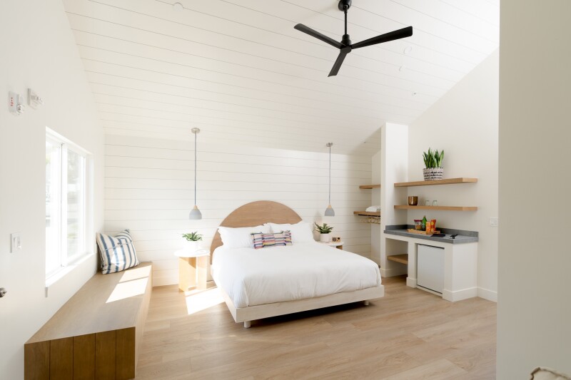 White interior of guest room at the Pacific Motel
