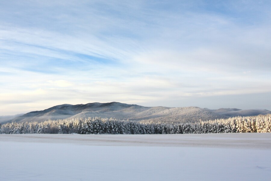 Distant mountains over Mirror Lake, New York, in winter