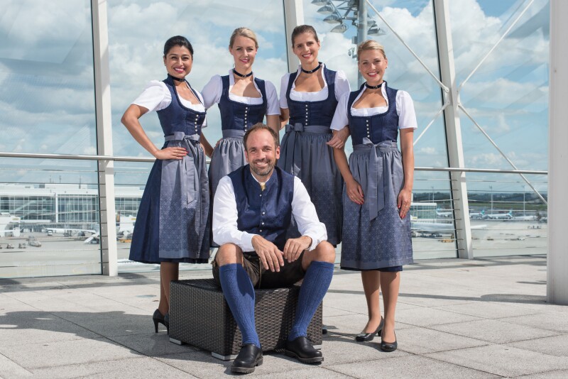 Munich’s traditional clothing specialist, Angermaier, designed the custom dirndls and lederhosen for the flight attendants.