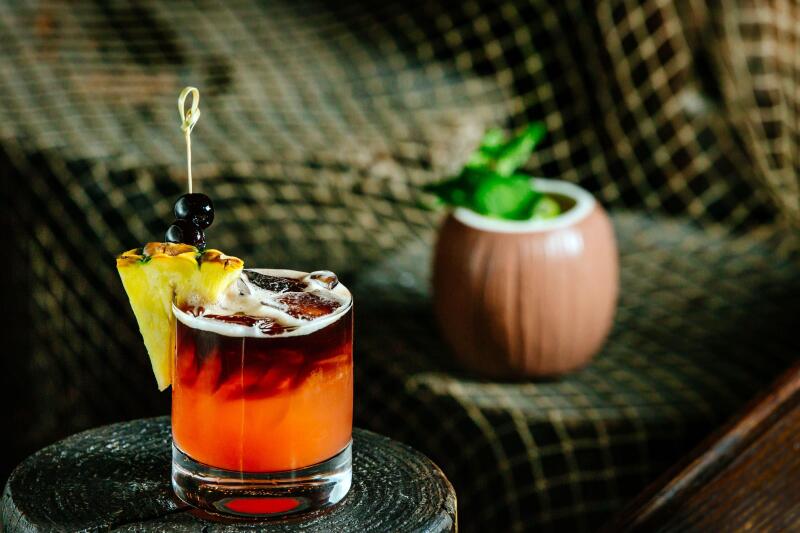Two tropical cocktails side by side at the Tonga Room in San Francisco's Fairmont Hotel.