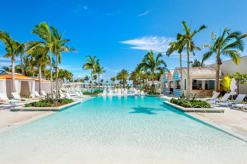Large pool and palm trees at Baha Mar