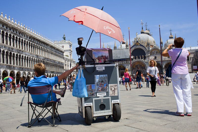In the city’s principal public square, Piazza San Marco, St. Mark’s Basilica provides an ornate backdrop for tourist photo ops.
