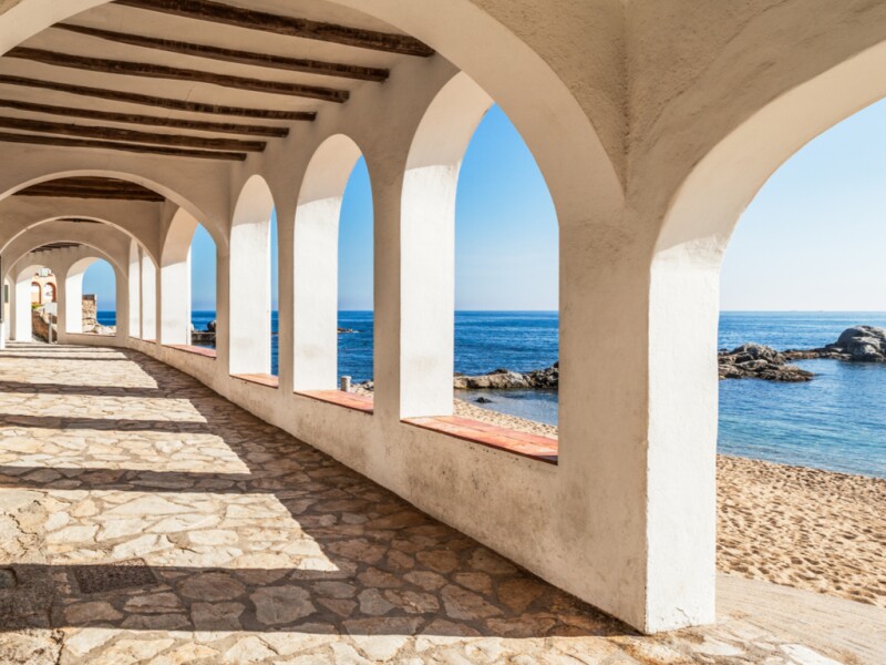 The arched centuries-old colonnades of Port Bo Beach