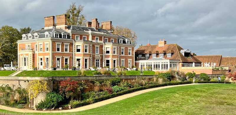 Lots of trimmed grass fields and bushes surround Heckfield Place to give off a royal vibe for the guests.