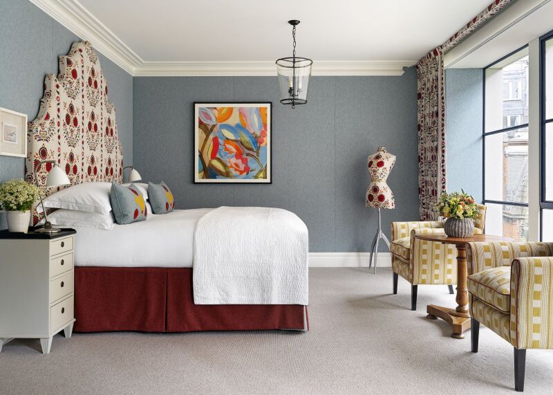 Interior of a Ham Yard guest room with bright colors and patterns