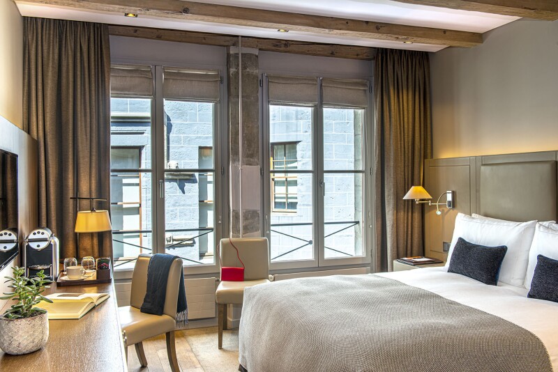 Guest room at Hôtel Les Armures
