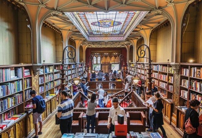 An art nouveau bookstore with stained glass ceiling
