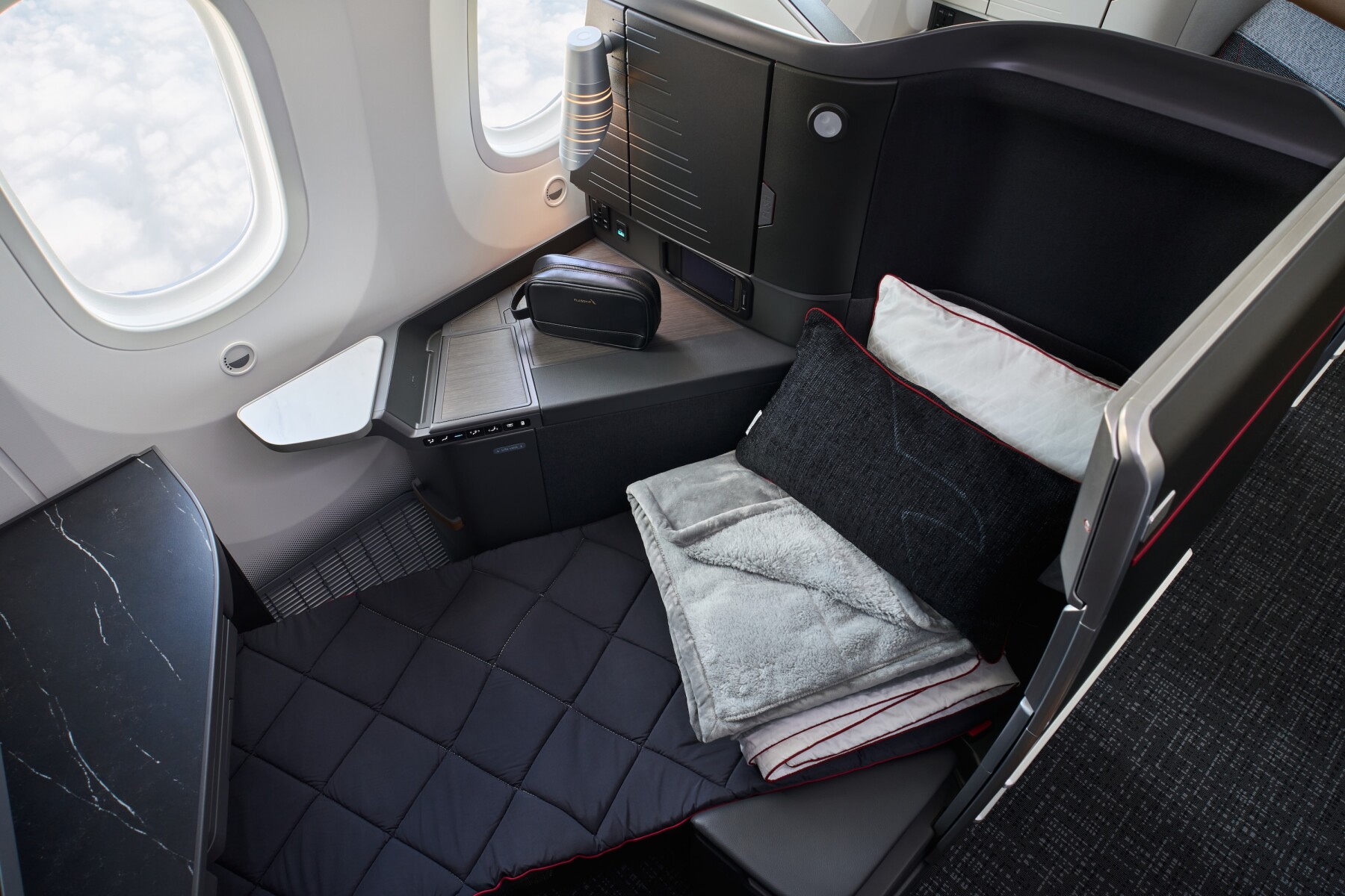 American Airlines Debuts New Flagship Business Suites - AFAR