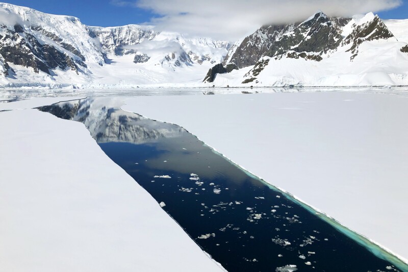 Among the ways to engage with the Antarctic landscape is an opportunity to walk on an ice floe like this one.