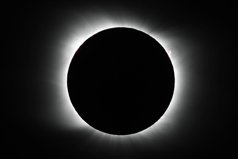 The moon covers the sun during a total solar eclipse in Piedra del Aguila, Argentina on Monday, December 14, 2020.