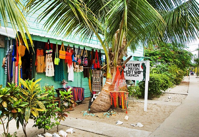 Placencia, Belize - The mile-long ¥sidewalk¥ in Placencia is lined with shops, restaurants, and hotels, such as the Katampe Mayan Gift Shop