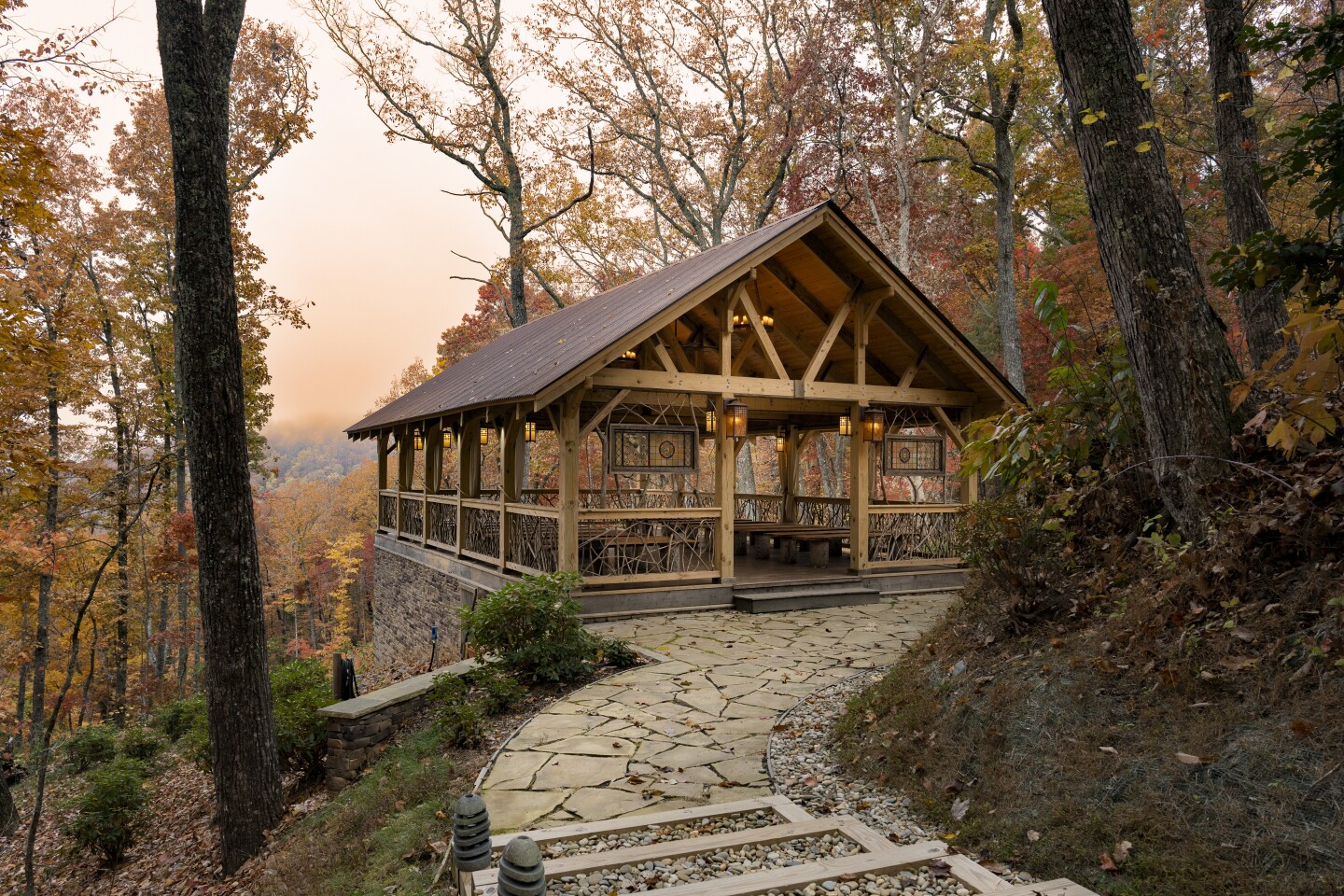 Wooden platform with a roof around a forest