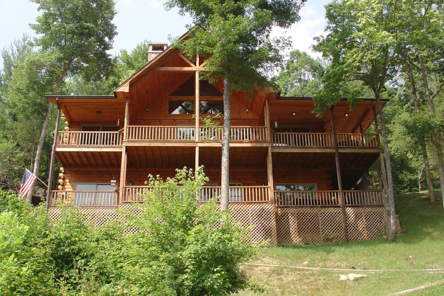 Exterior of two-story log cabin in Topton, North Carolina, with room for two four-person families