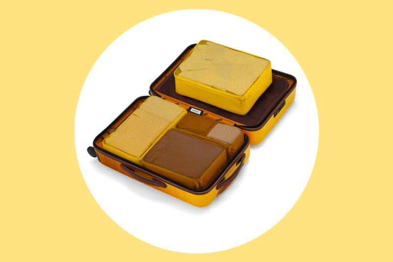 Each of the four packing cubes is a different size.