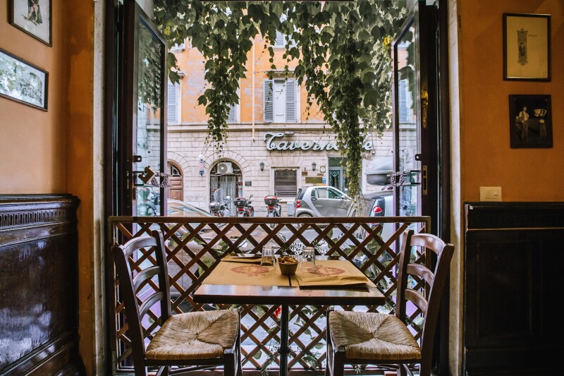 Table for two in a window seat at Ai Tre Scalini