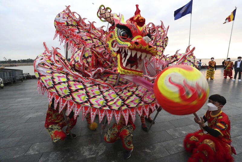 People from the Cambodian Chinese community perform a dragon dance in Phnom Penh ahead of Lunar New Year.