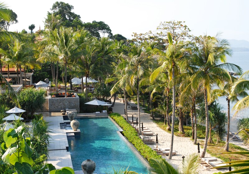 Luxuriate on Phuket at the all-villa Trisara resort, with extras like a private beach, spa, and Michelin-starred eatery.
