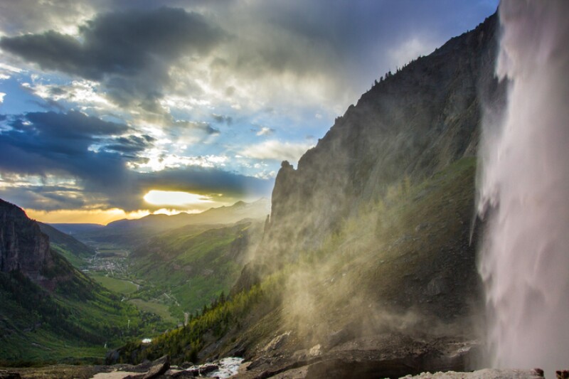 Mist sweeps off Bridal Veil Falls, the largest waterfall in Colorado.
