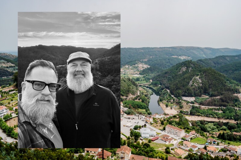 Black-and-white photo of two men with white beards, standing outdoors (L inset); aerial view of village with Mondego River between forested hills (R)