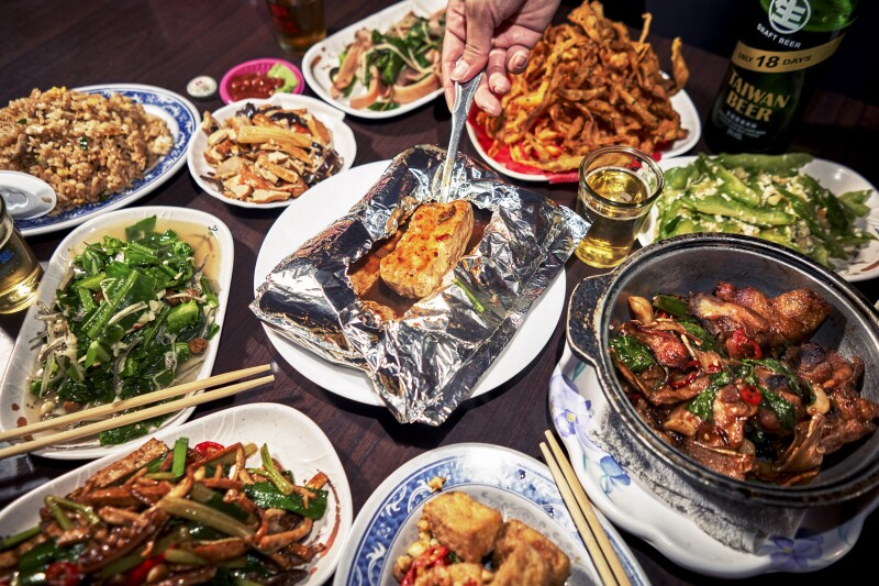A spread of food at Baxian Grill