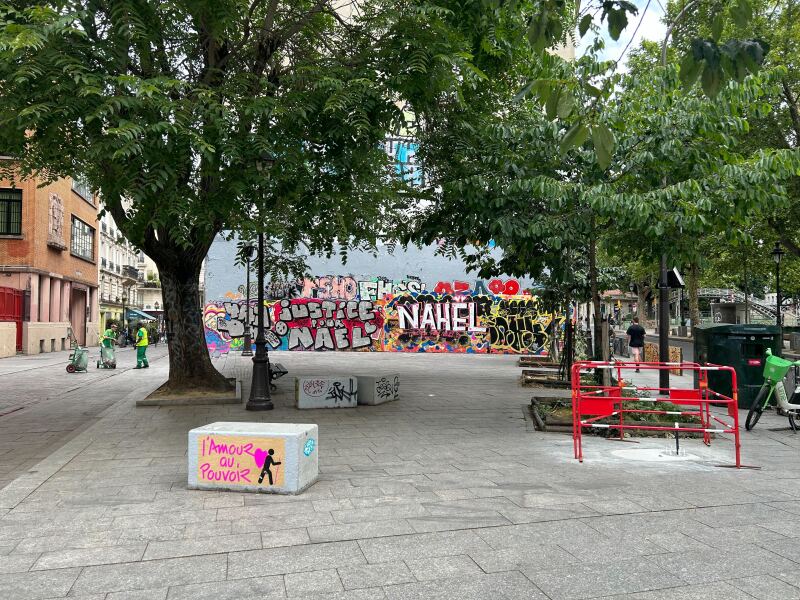 Graffiti in Paris depicting the name of a teenager killed by a police officer