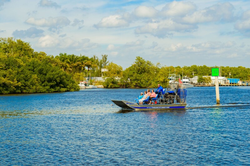 an airboat rides along the Barron River in Everglades City Florida