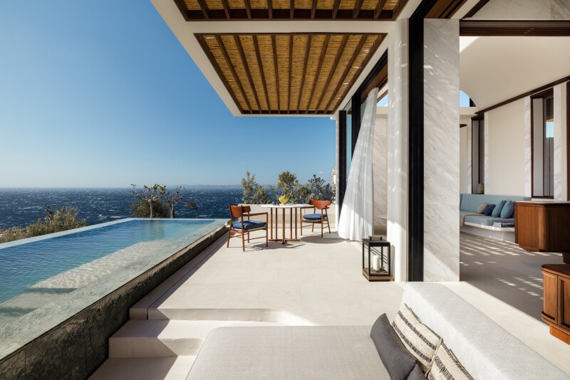 This guest room terrace at One&Only Kéa Island has a large private pool that faces the sea.