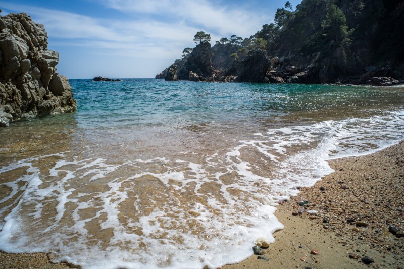 Empty El Golfet beach viewed from water level