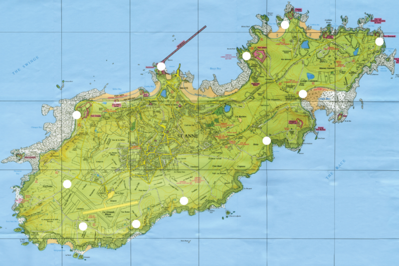 Each white dot indicates the location of an Alderney Stone created by Andy Goldsworthy.