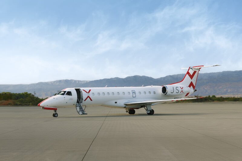A JSX 30-passenger Embraer E135 aircraft on the tarmac