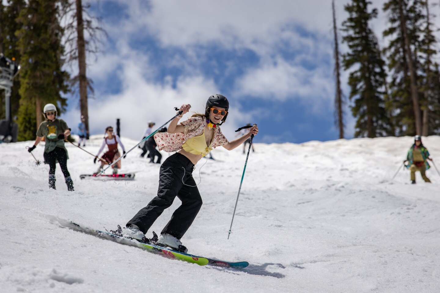 Skiiers and snowboarders hit the slopes in their best bikinis and swim trunks on Arapahoe Basin's annual swimwear day event.