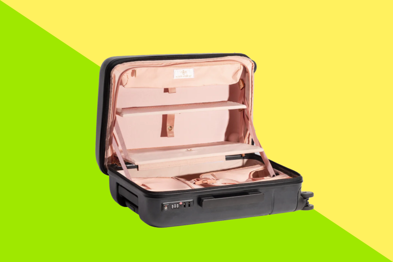 Gray Royce & Rocket carry-on open to pink interior