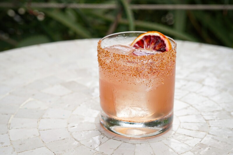 A peach-colored cocktail at Esters Wine Shop & Bar