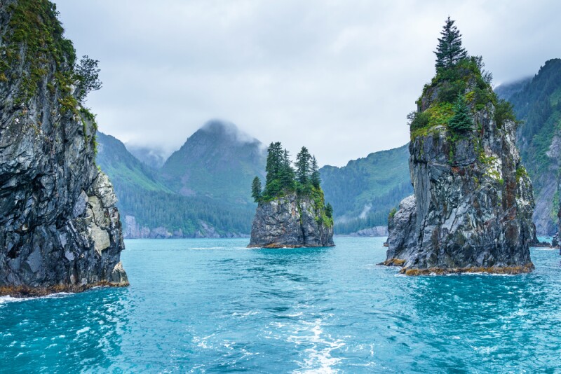 Three spires sticking out of the water in Kenai Fjords National Park