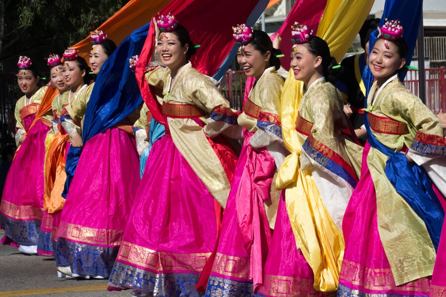 A group of eight women in habok dancing