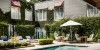 Greek Revival family mansion, Hotel Ella, Austin, Texas, Neiman Marcus’ Stanly Marcus redecorated the interiors in 1925, understated decor, a locally sourced restaurant, and an art collection, original Ansel Adams photographs
