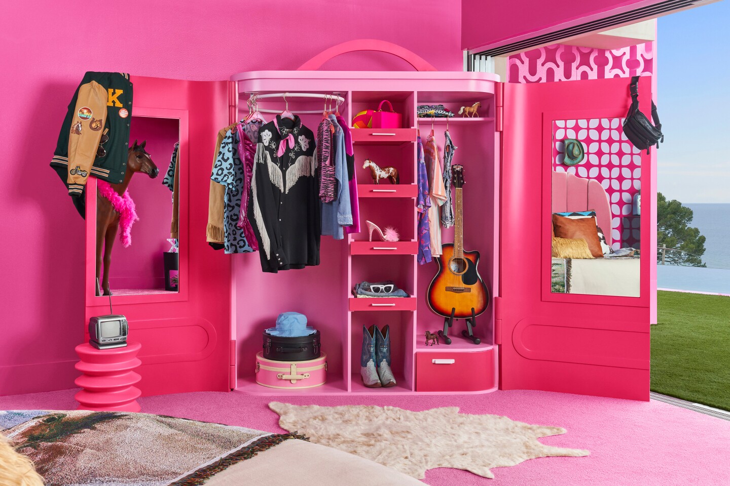 A peek inside Ken's closet at Barbie's Malibu DreamHouse