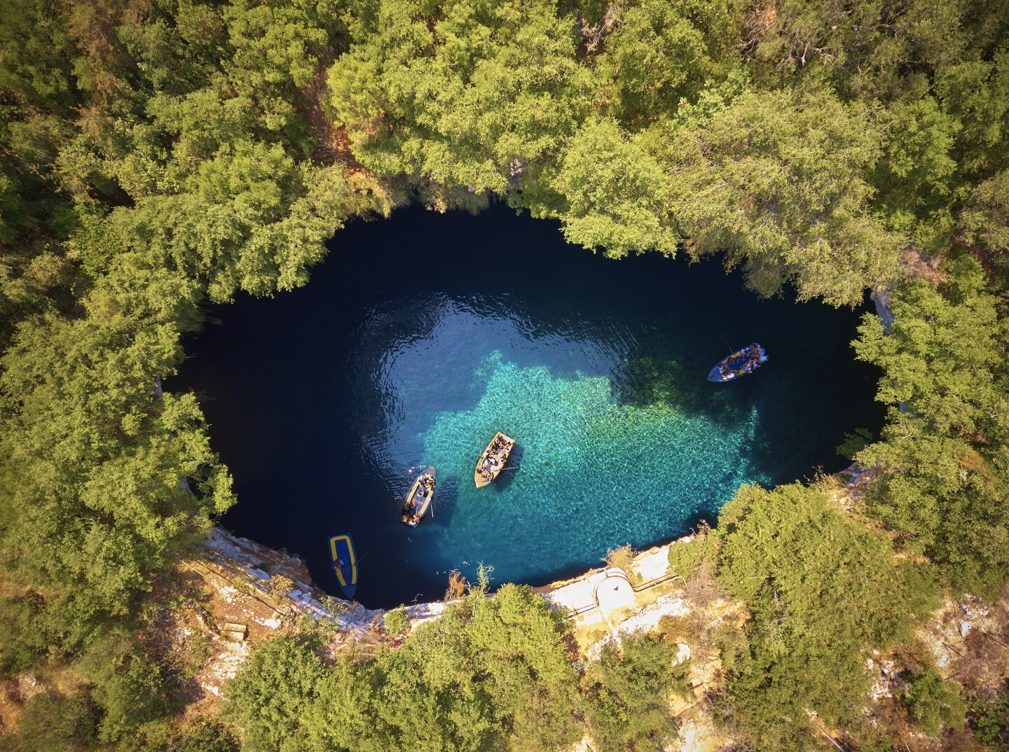 Melissani Cave ( Melissani Lake) near Sami village in Kefalonia island , Greece, as viewed from above