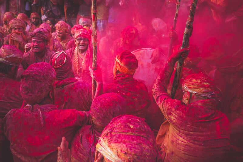 A pink cloud covers the crowd in Barsana, in northern India, during Holi.