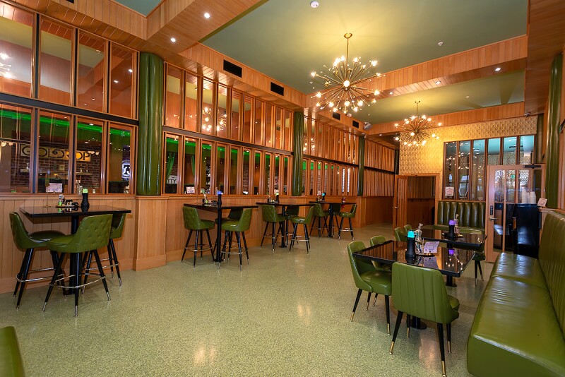 Interior of Moe Green's lounge, empty of people