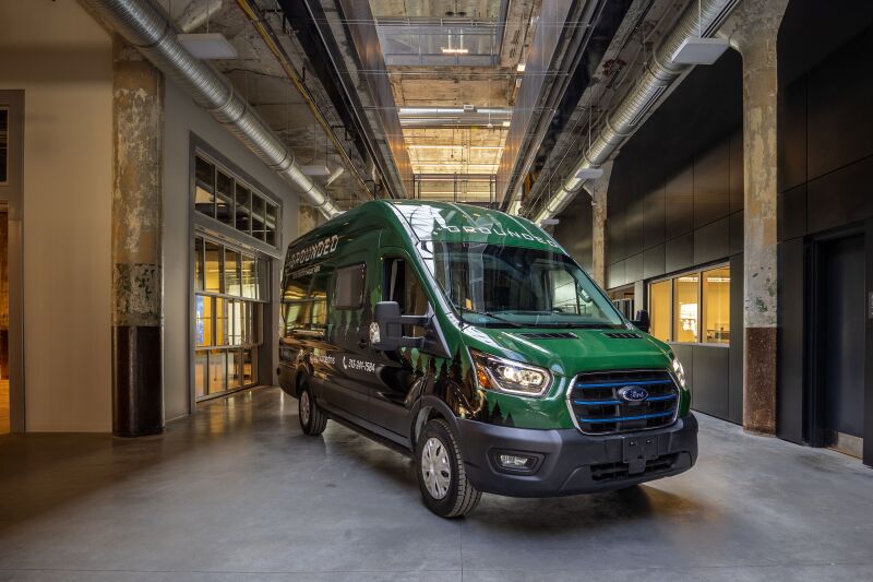 A green Grounded G1 inside a garage