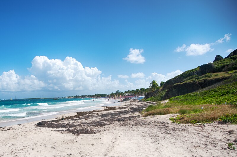 This Caribbean island is divided between the French Republic and the Kingdom of the Netherlands.
